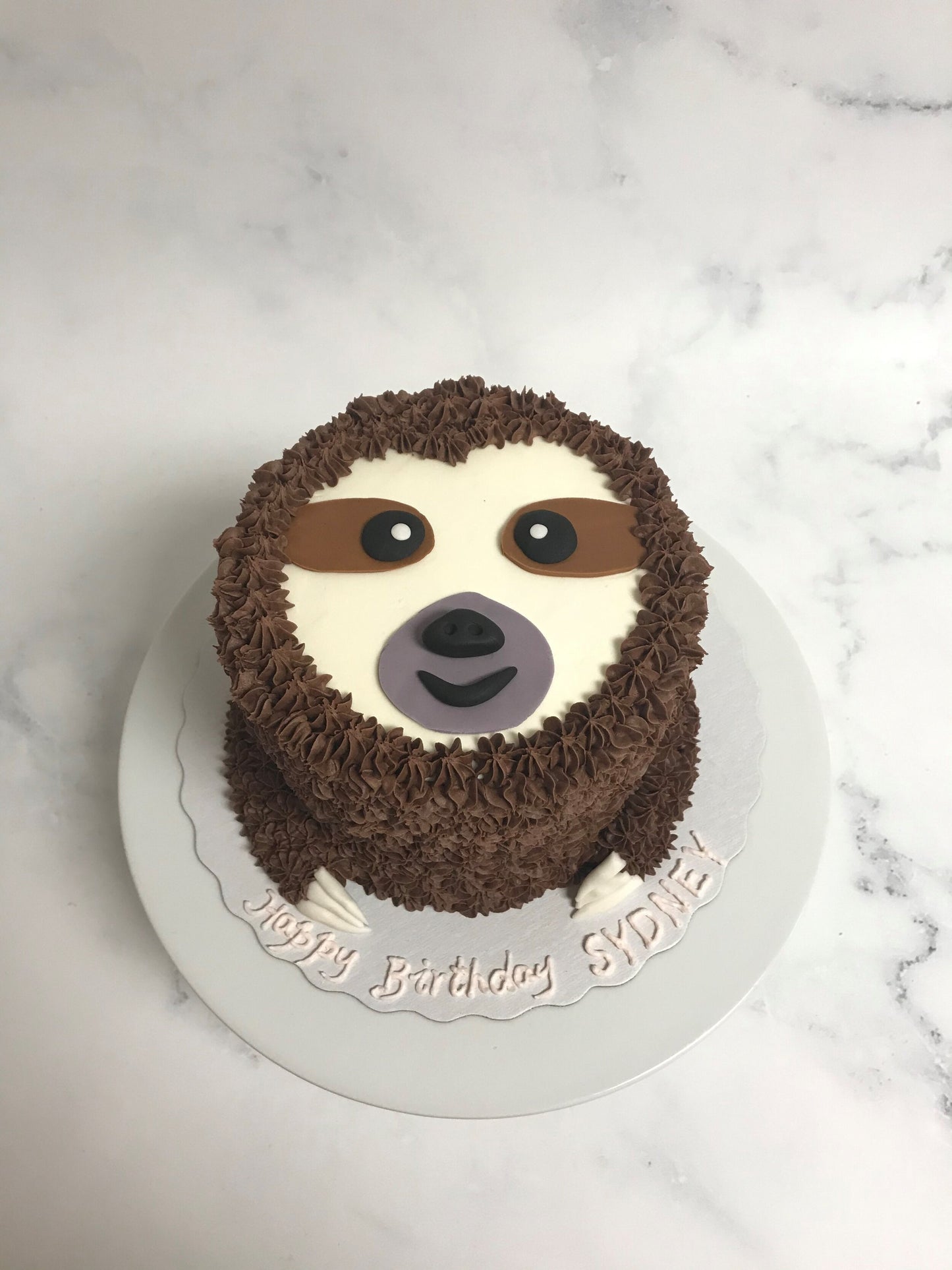 SAMMIE SLOTH CAKE